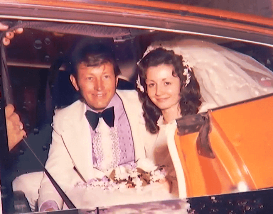 Gordon and his new wife in the back seat of their XA wedding car